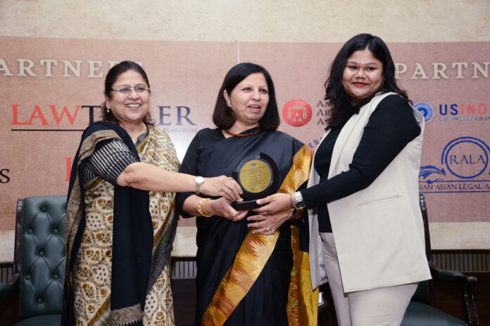 From left: Retired Justice Dr Sangita Dhingra Sehgal and Justice Rekha Palli, of Delhi High Court, present the award to Manokamana, IBLJ associate editor.